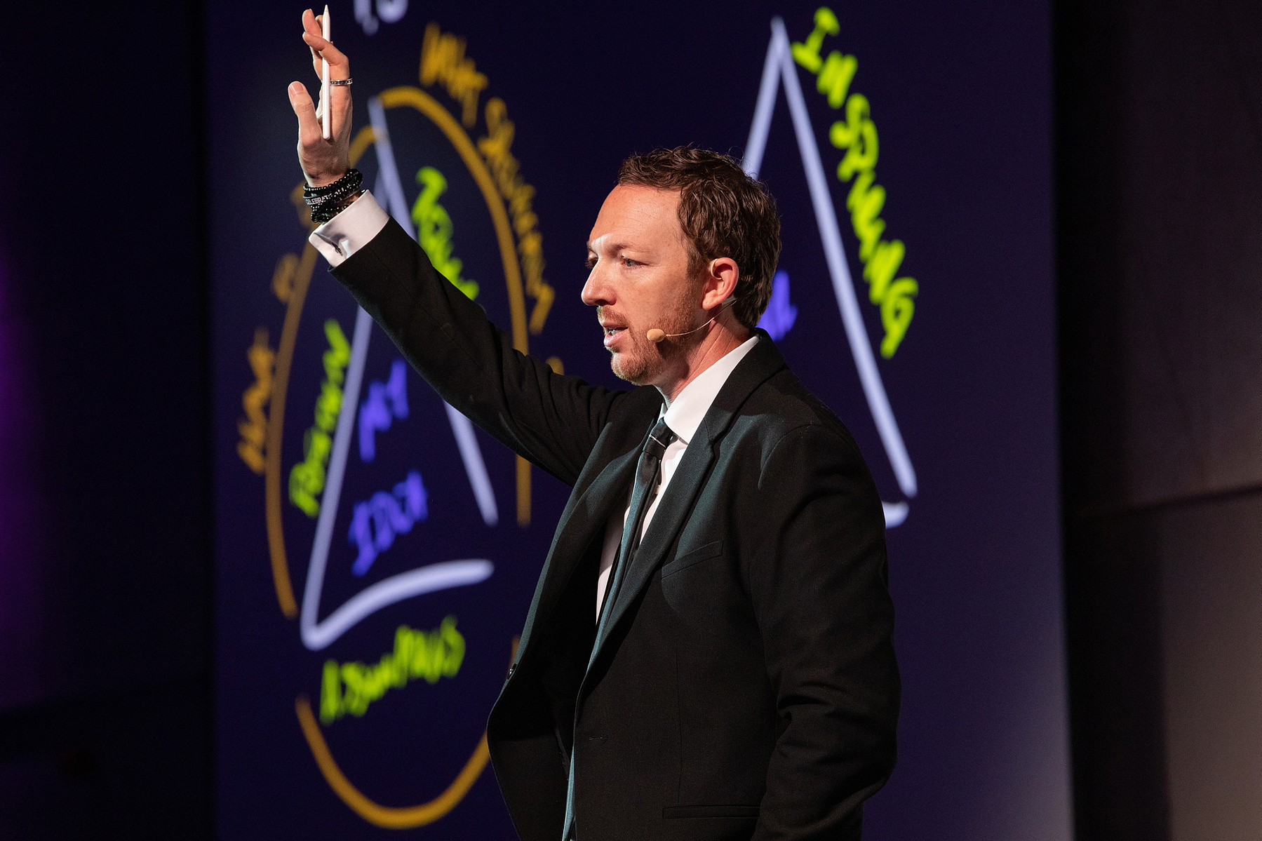 Professional Event photographer Dubin, speaker on stage at Salon Owners Summit 2023 in Dublin Royal Convention Centre