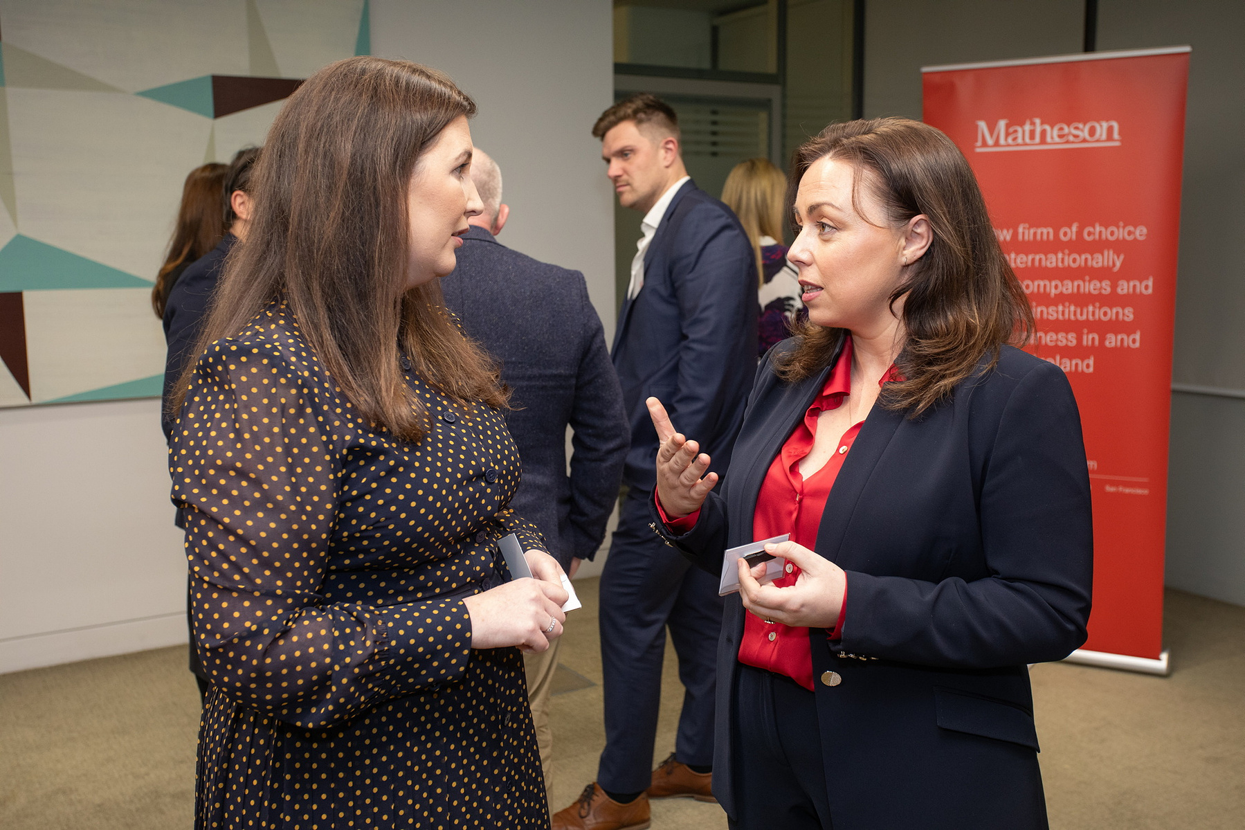 Event photo of attendees networking at The Legal 500, Green Summit Ireland 2023 at Matheson LLP Dublin. Corporate event photography www.eventimage.ie