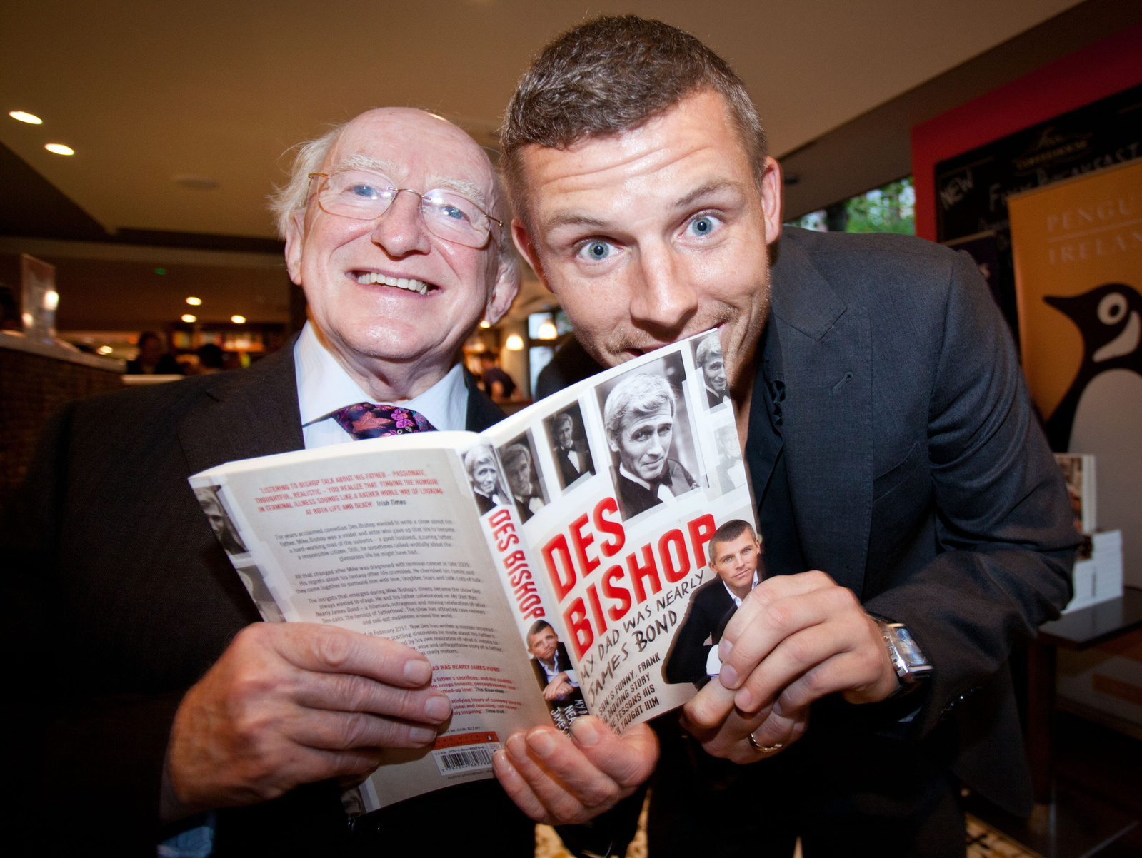 Press PR photo of President Michael D Higgins and Des Bishop at the photocall launch of Des Bishop's book 'My Dad was nearly James Bond'. Images syndicated onsite to National press media PR photographer Dublin