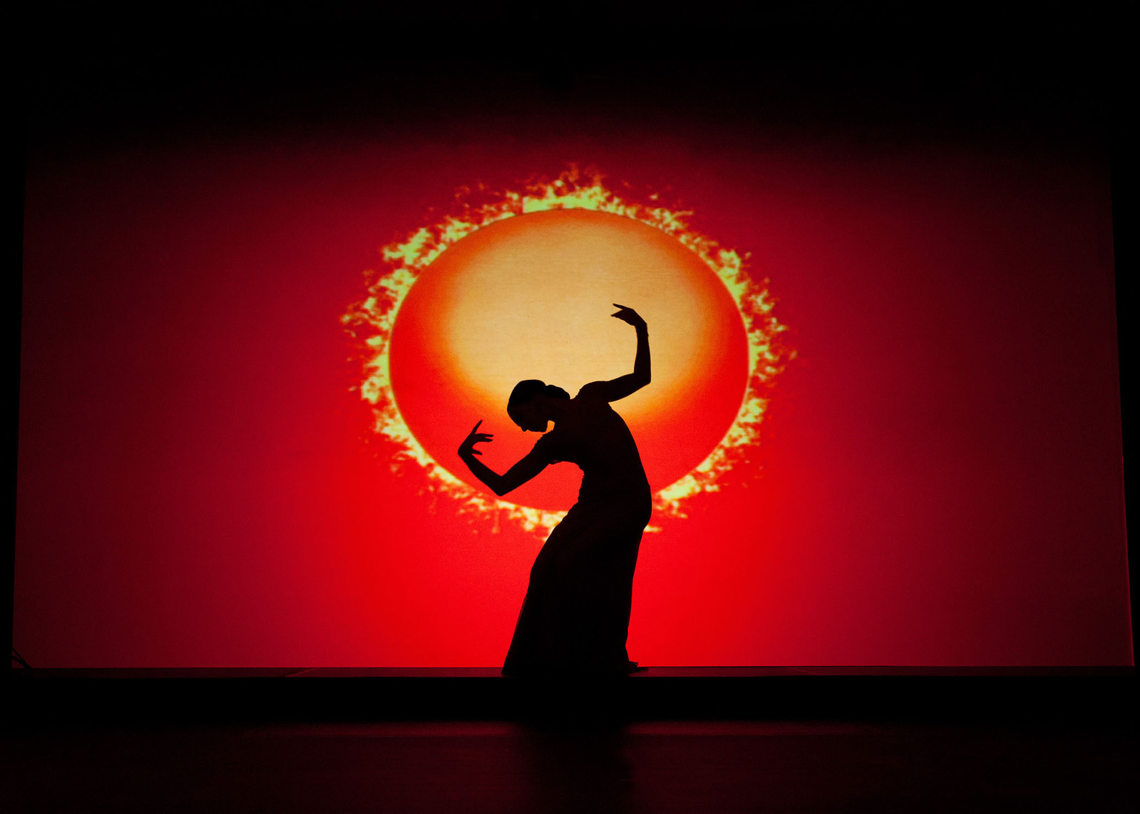 Live Event Photographer Spanish flamenco dancer on stage in the 3Arena Dublin with red background