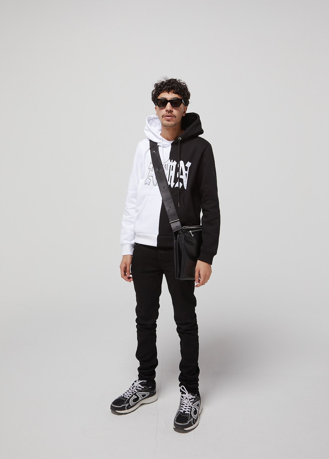 Black and white luxury premium cut and sew zip up hoodie.