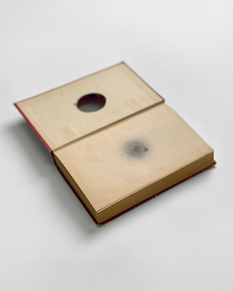 Book with a hole by artist Alejandro Javaloyas