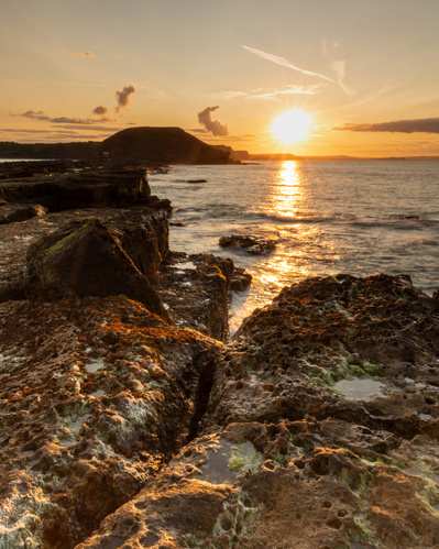 Sunset at Filey Brigg, North Yorkshire. A photograph by Tim Pearson