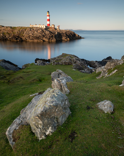 Reflections of Eilean Glas Lighthouse, on the island of Scalpay, Harris and Lewis. A photograph by Tim Pearson