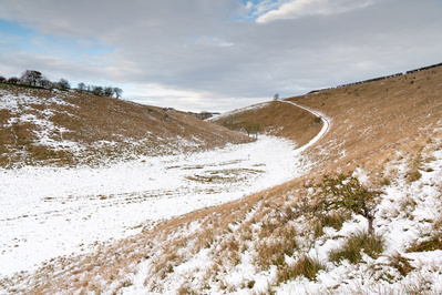 Early winter snowfall on the Waves and Time land art of Thixendale in the Yorkshire Wolds. A photograph by Tim Pearson.
