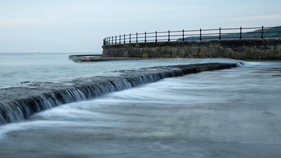 High tide edges over the sea wall at Scarborough South Bay. A photograph by Tim Pearson.