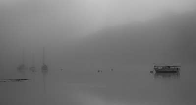 Yachts in early morning mist on the Tresillian river, Cornwall. A photograph by Tim Pearson.