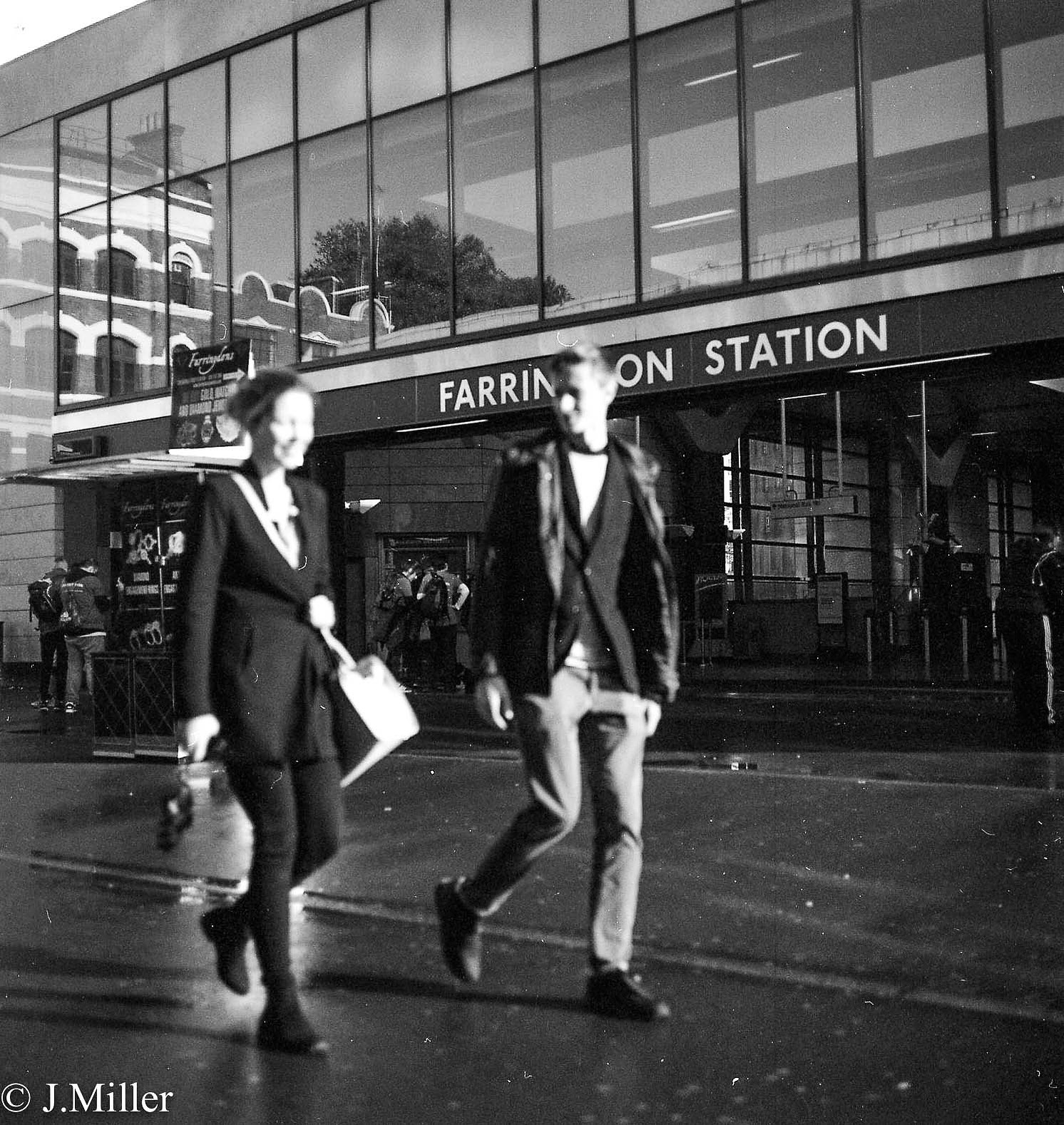 A couple outside a station