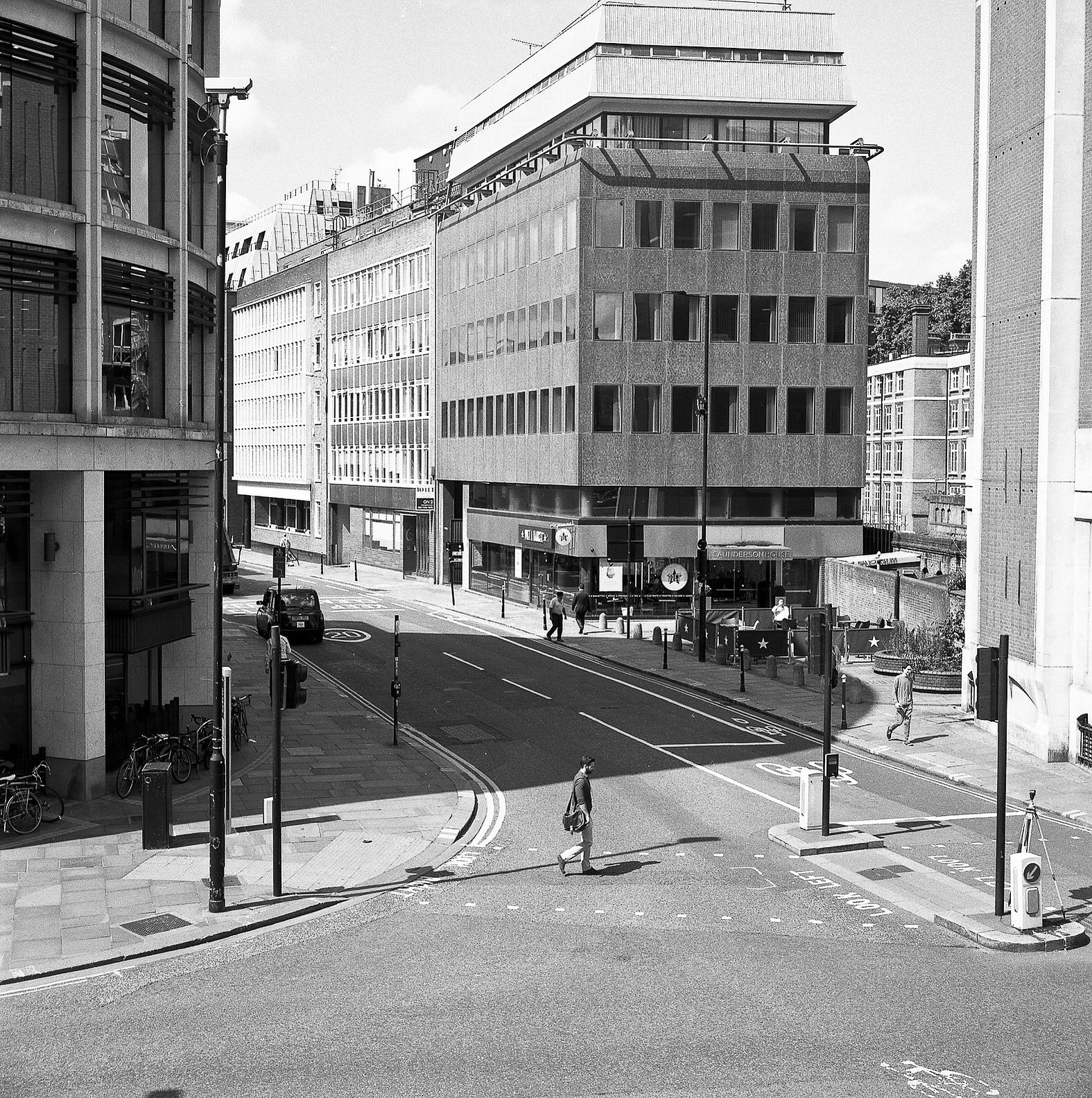 A man crosses the street