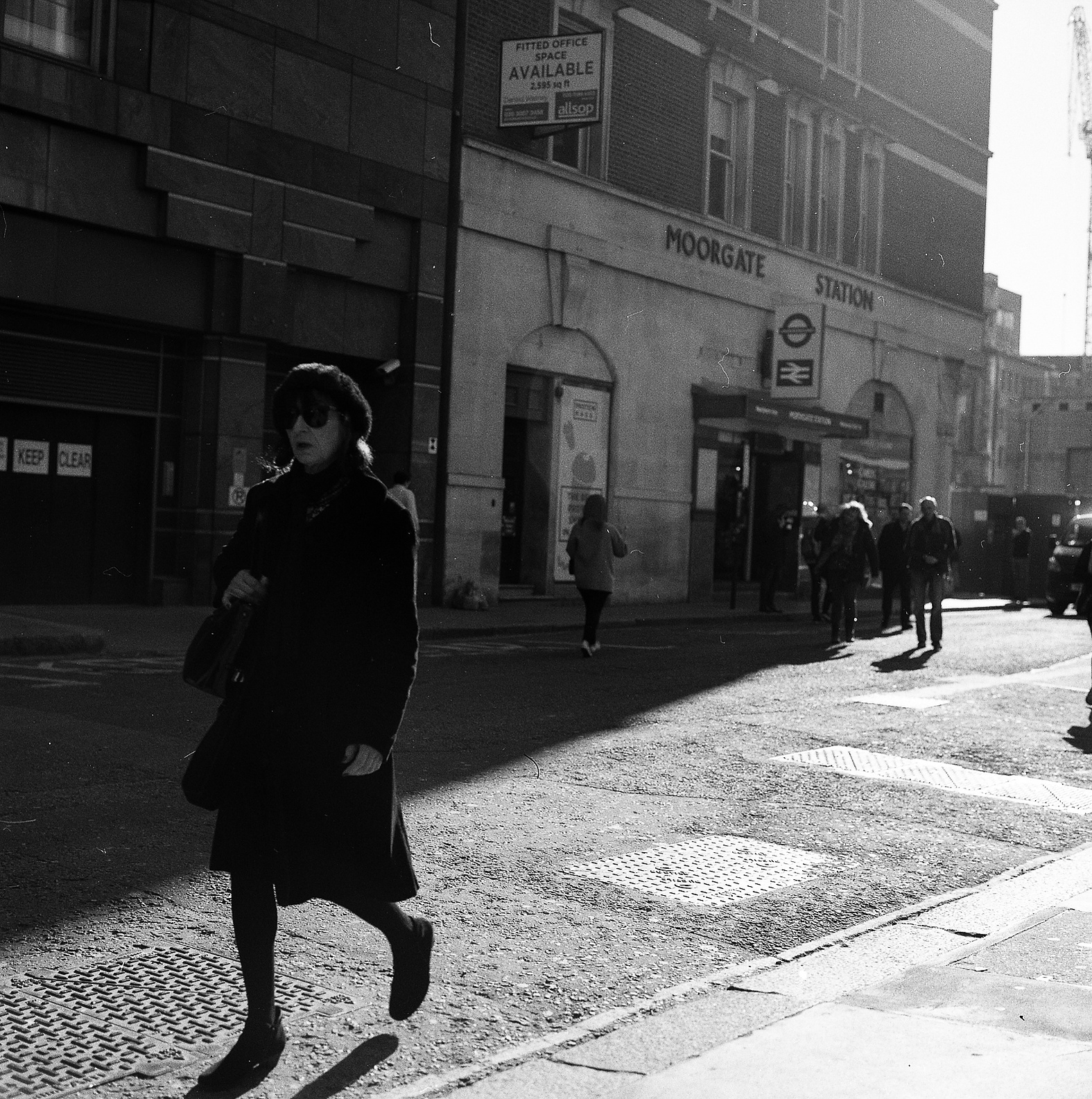 A woman outside the station.
