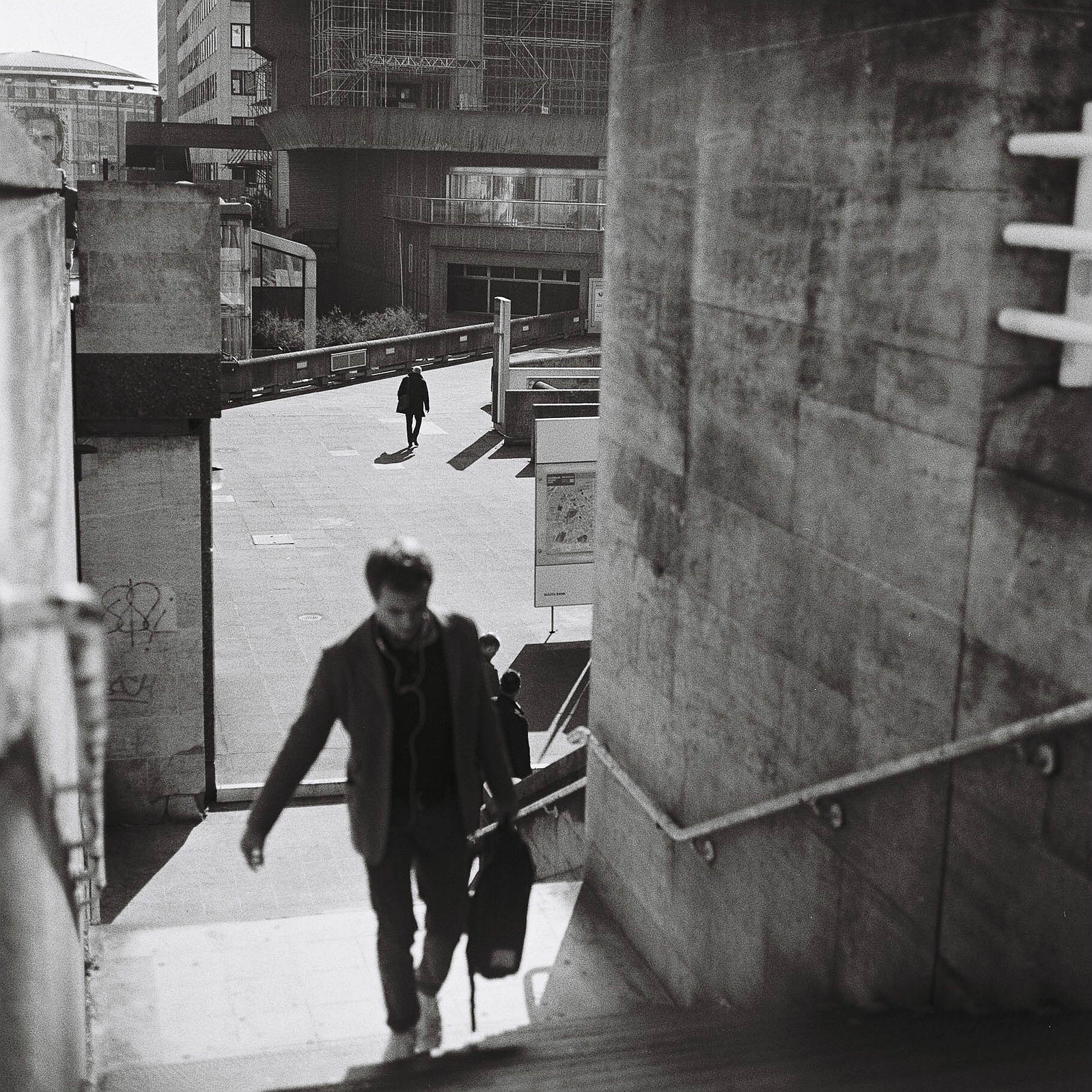 A man climbs the stairs