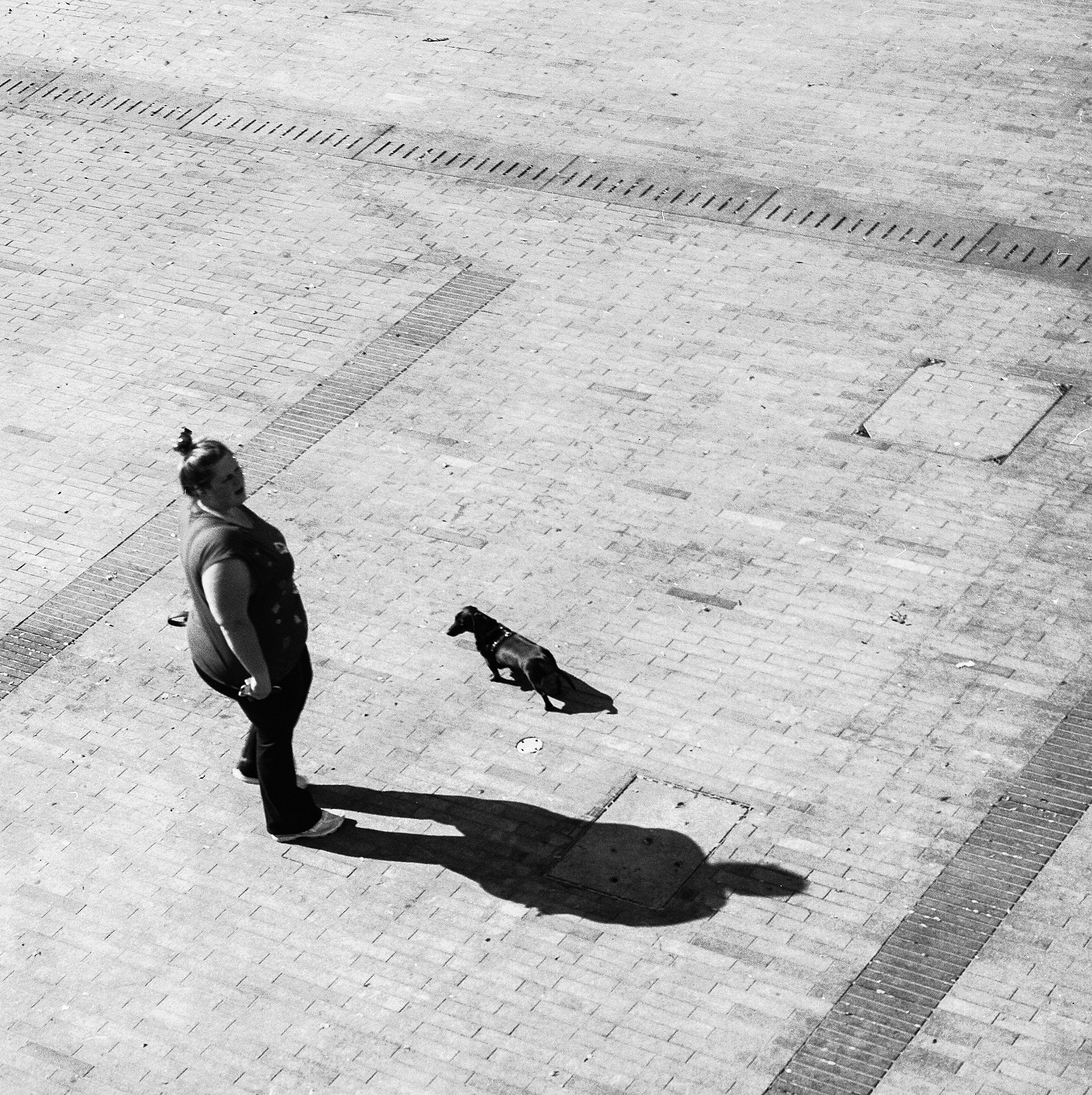A woman stands with her dog - Bronica s2