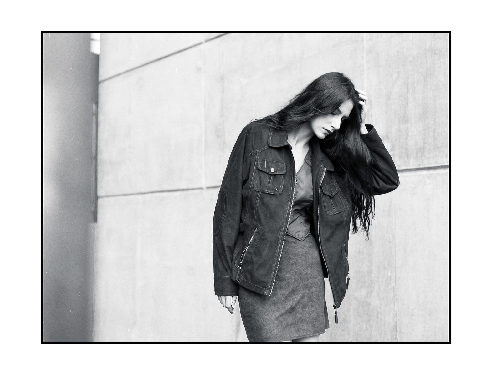 woman holding her head in a picturesque way.