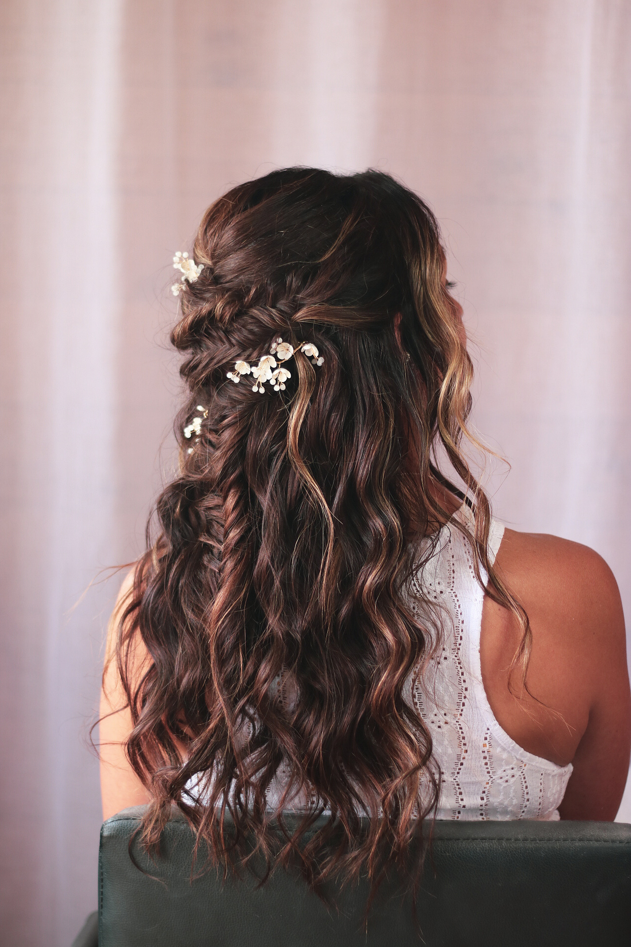 wavey bridal hair with half up braided effect
