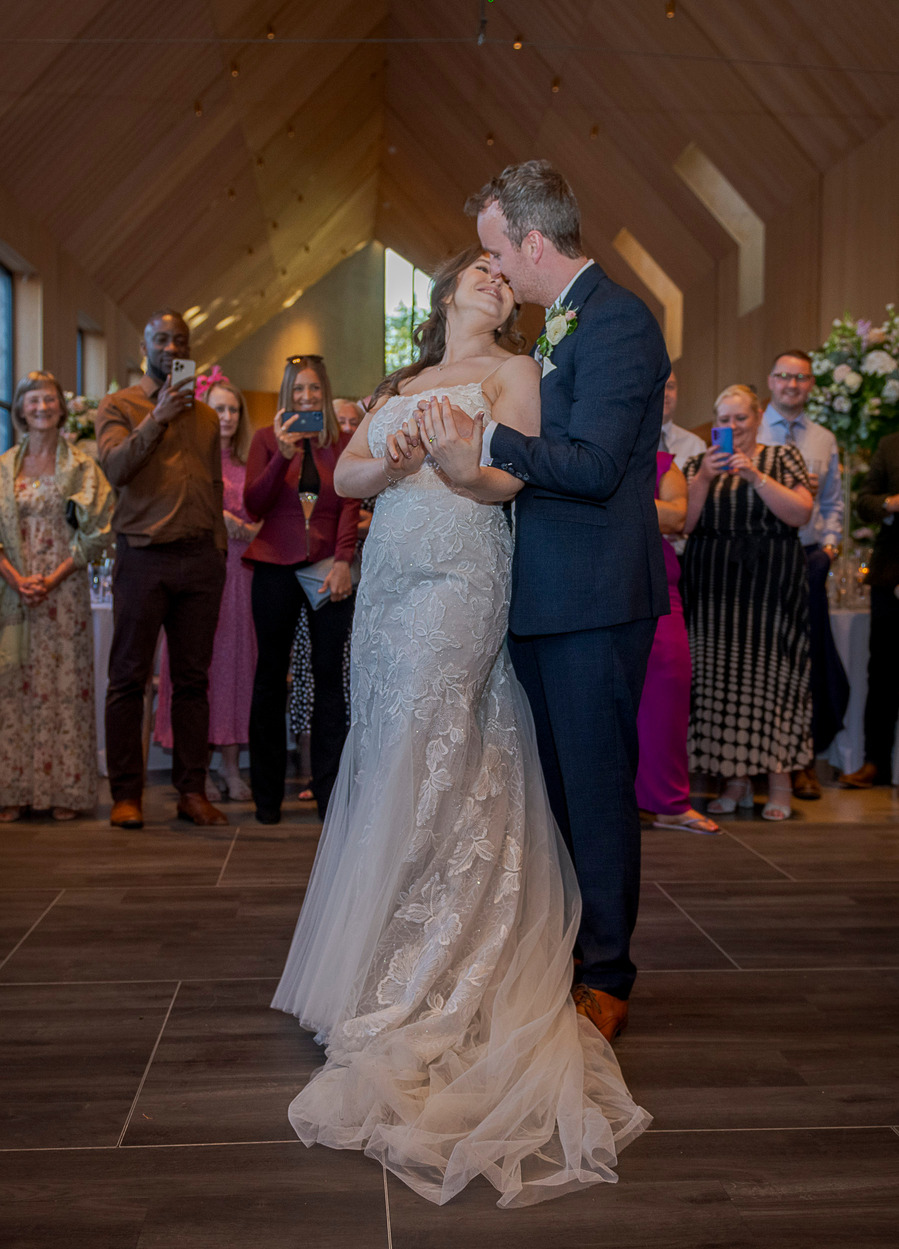 natural and authentic wedding photography, bride and groom first dance at wedding 