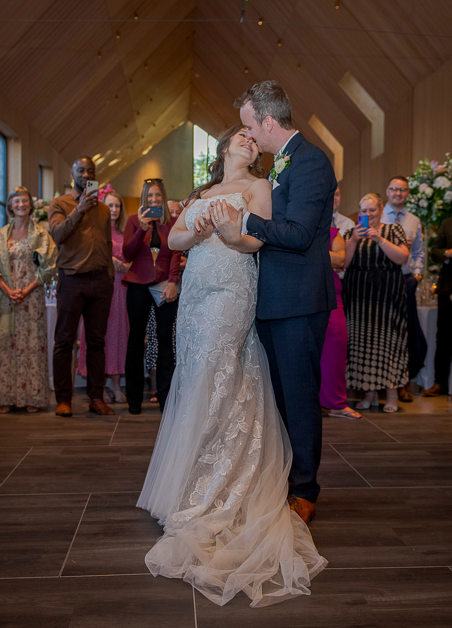 natural and authentic wedding photography, bride and groom first dance at wedding 