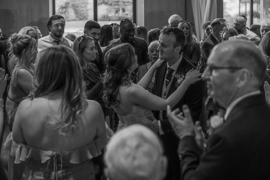 natural and authentic wedding photography, bride and groom dancing at wedding