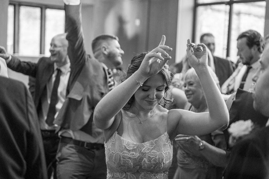 natural and authentic wedding photography, bride on dance floor at wedding