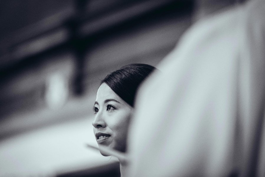 candid and natural wedding photography, city centre urban wedding, candid portrait of bride in church 