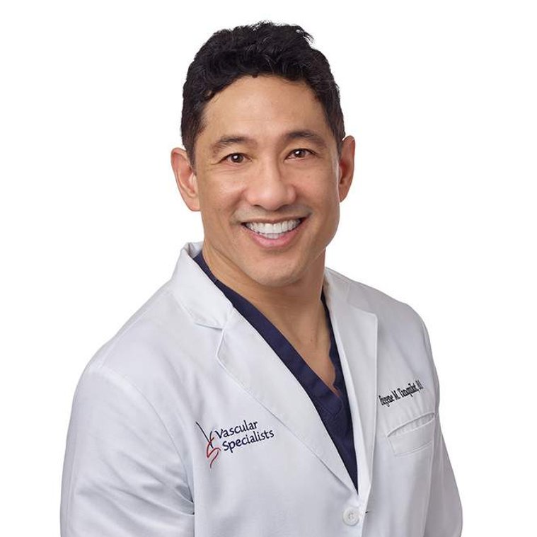Illustrative portrait of vascular doctor wearing lab coat photographed on white background.