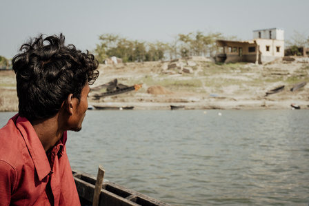 India, West Bengal, 2022-02 Lalu is looking at his former school, destroyed  by the Yaas cyclone, he became a fishermen because the new school is too far away for him. Photo by Alexandra DE DIVES &amp;amp;amp;amp;amp;#x2F; Collectif DR
Inde, Bengale occidental, 2022-02 Lalu regar
