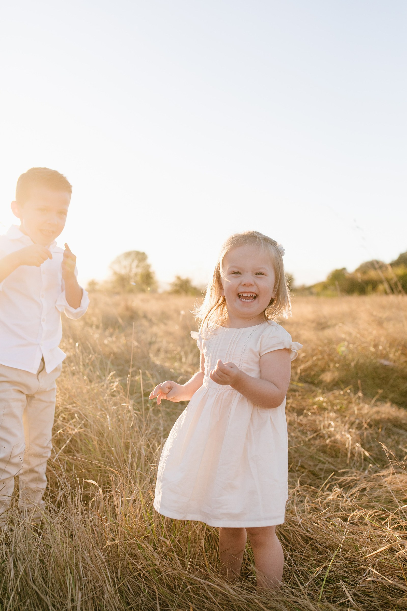 Family mini-session portraits at Discovery Park in Seattle all summer long in golden natural light