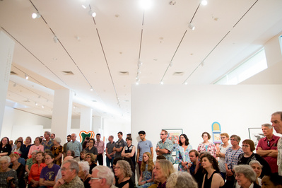 An artist talk is being listened to at the MMoCA in Madison, WI. 