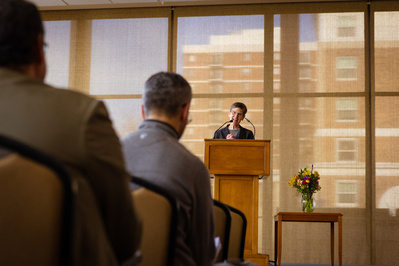 A women is talking at a podium in the Pyle Center in the Alumni Lounge on the University of Wisconsin Madison Campus. I love this room. 