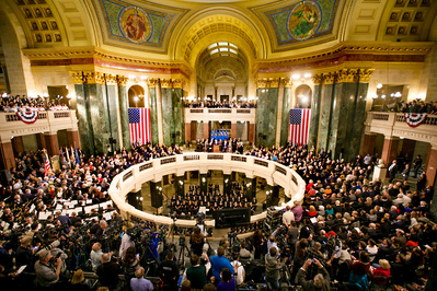 Governor Evers is being sworn into the office at the Wisconsin State Capitol.