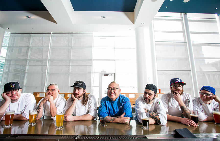 Chef Tory Miller sits with his staff at the bar at his restaurant Graze in downtown Madison, WI. 