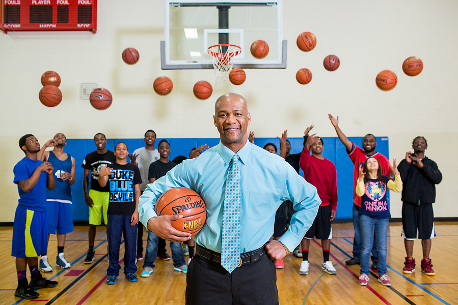 A man and his youth basketball team! 