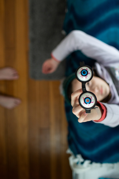 artistic photo taken from above a child as they look toward the camera