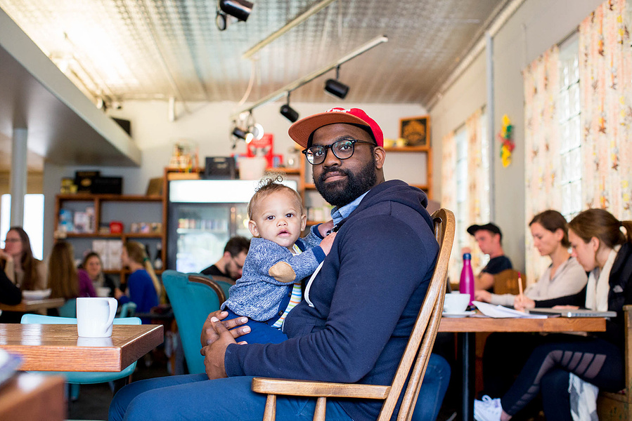A dad and his son are at the Johsnson Public House coffee shop in Madison, Wi. 