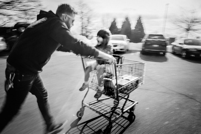 a candid photo family documentary style in black and white