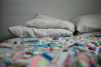 lifestyle photography shows a family bedroom