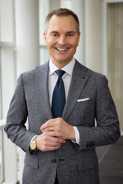 Man wears a suit. Good for him. 