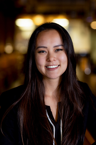 A gal works at Destree Architecture & Design. She has long hair and it's nice. 