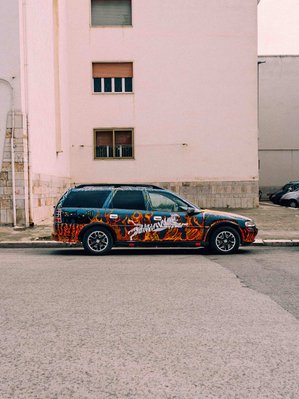 Customized car with flames and white tiger details