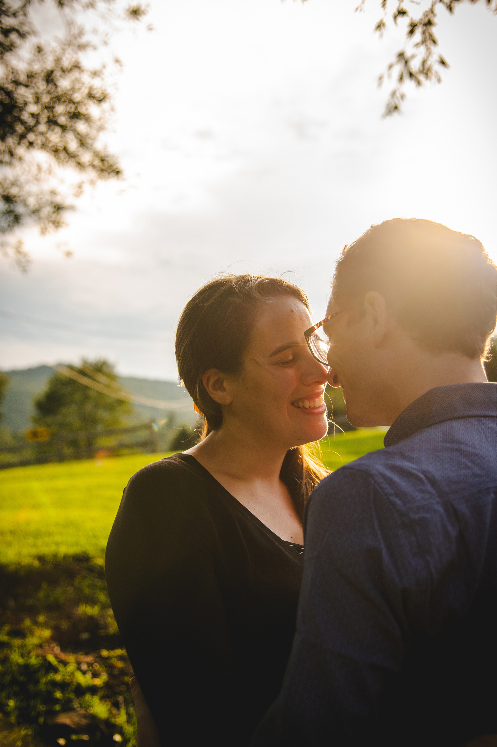 Engaged couple in a sweet embrace. 