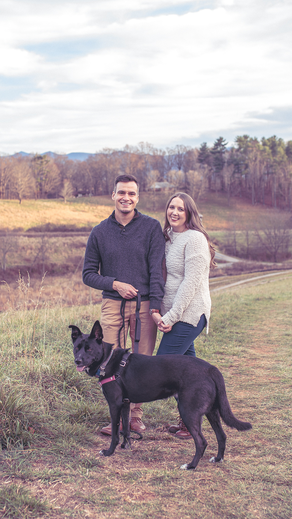 A couple and their dog captured at Mountain Bailey Preserve in Mars Hill for a family photography session