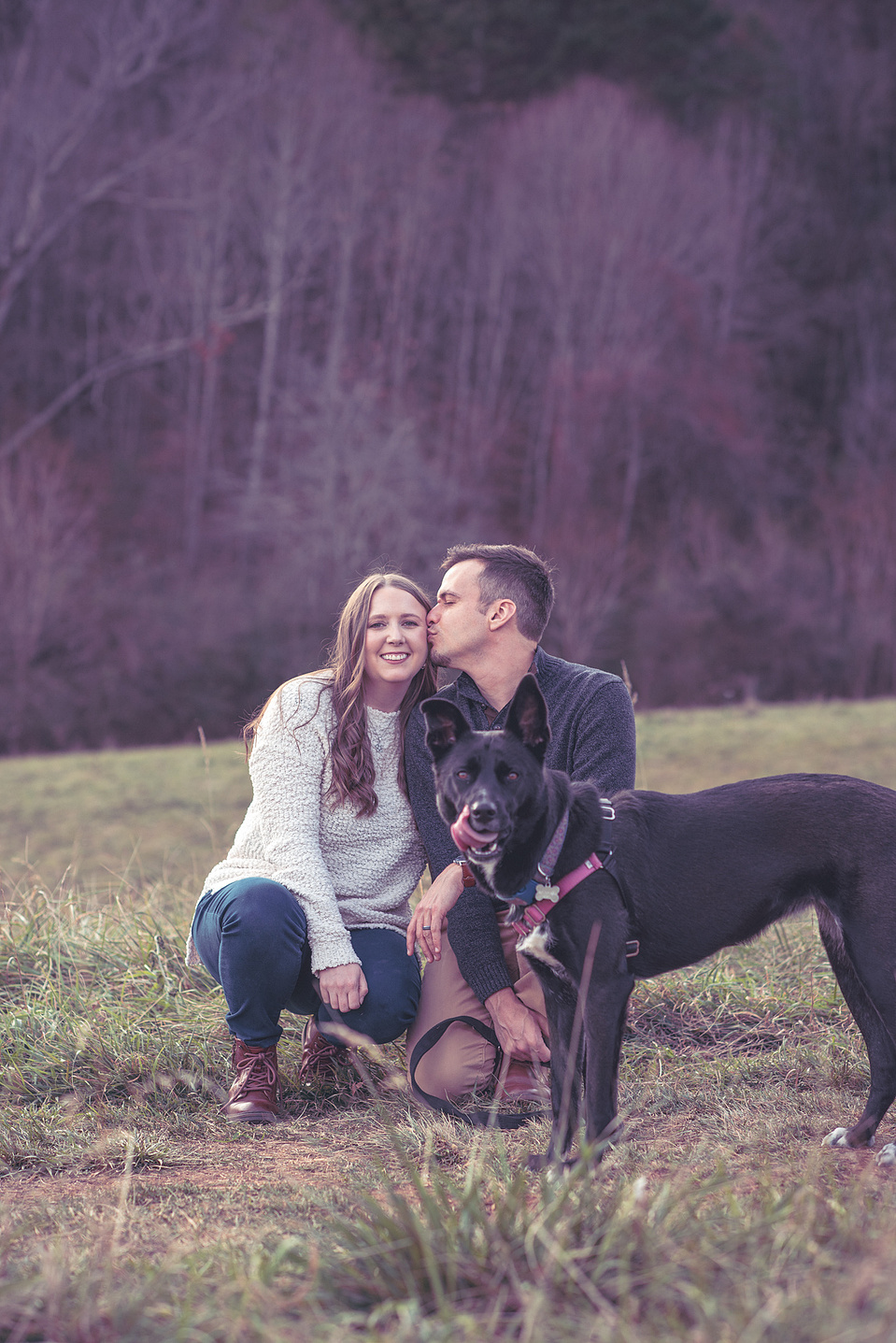A married couple and their dog photographed in the mountains outside of Asheville, NC 