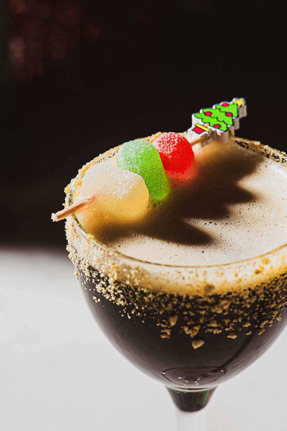 A festive winter drink at Pillar Bar, a rooftop spot in Asheville, NC as part of a food photography shoot