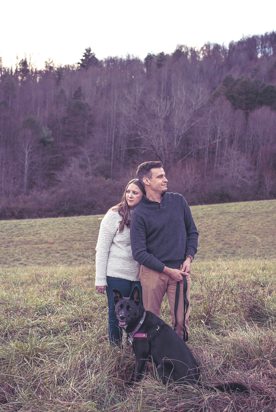 A married couple and their dog photographed in the mountains outside of Asheville, NC 