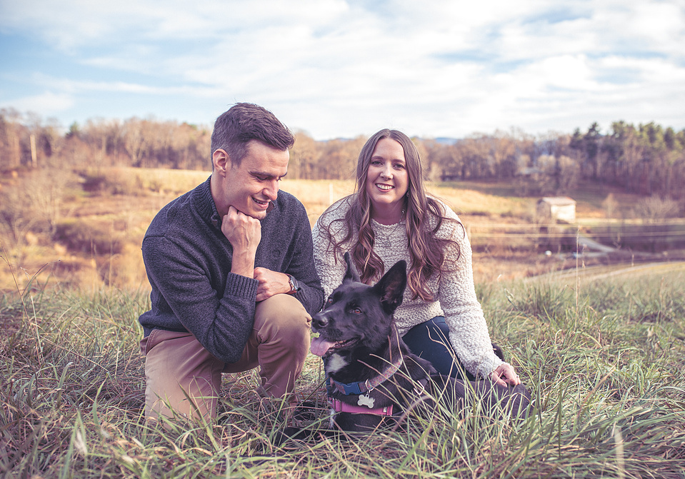 A married couple and their dog photographed in the mountains outside of Asheville, NC 