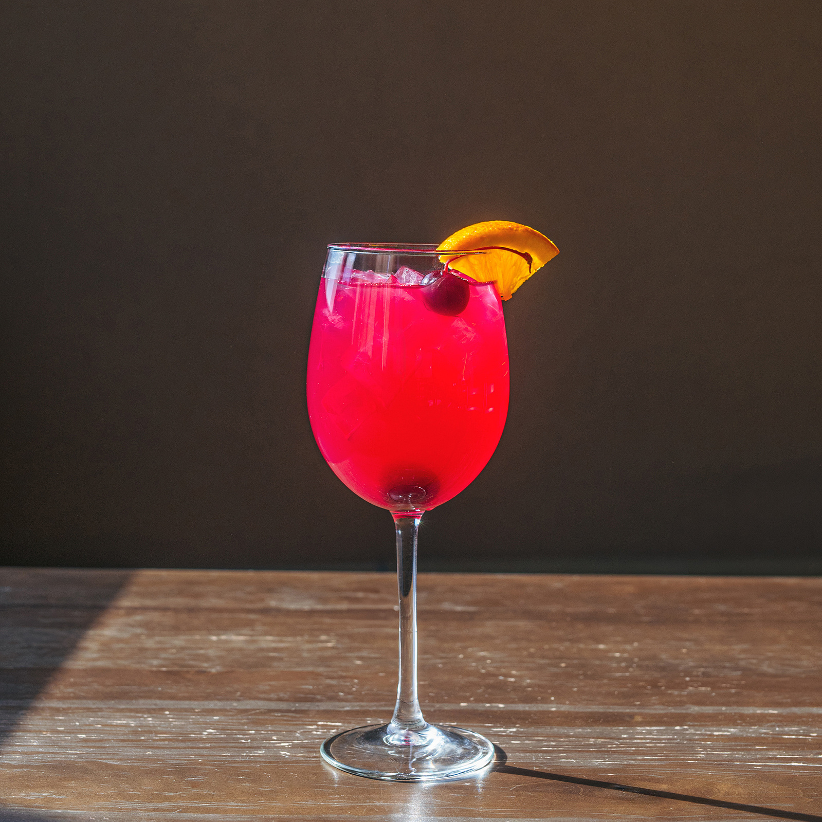 A fruity winter cocktail at Vinnie's in South Asheville captured by Asheville photographer GraceD Photography.
