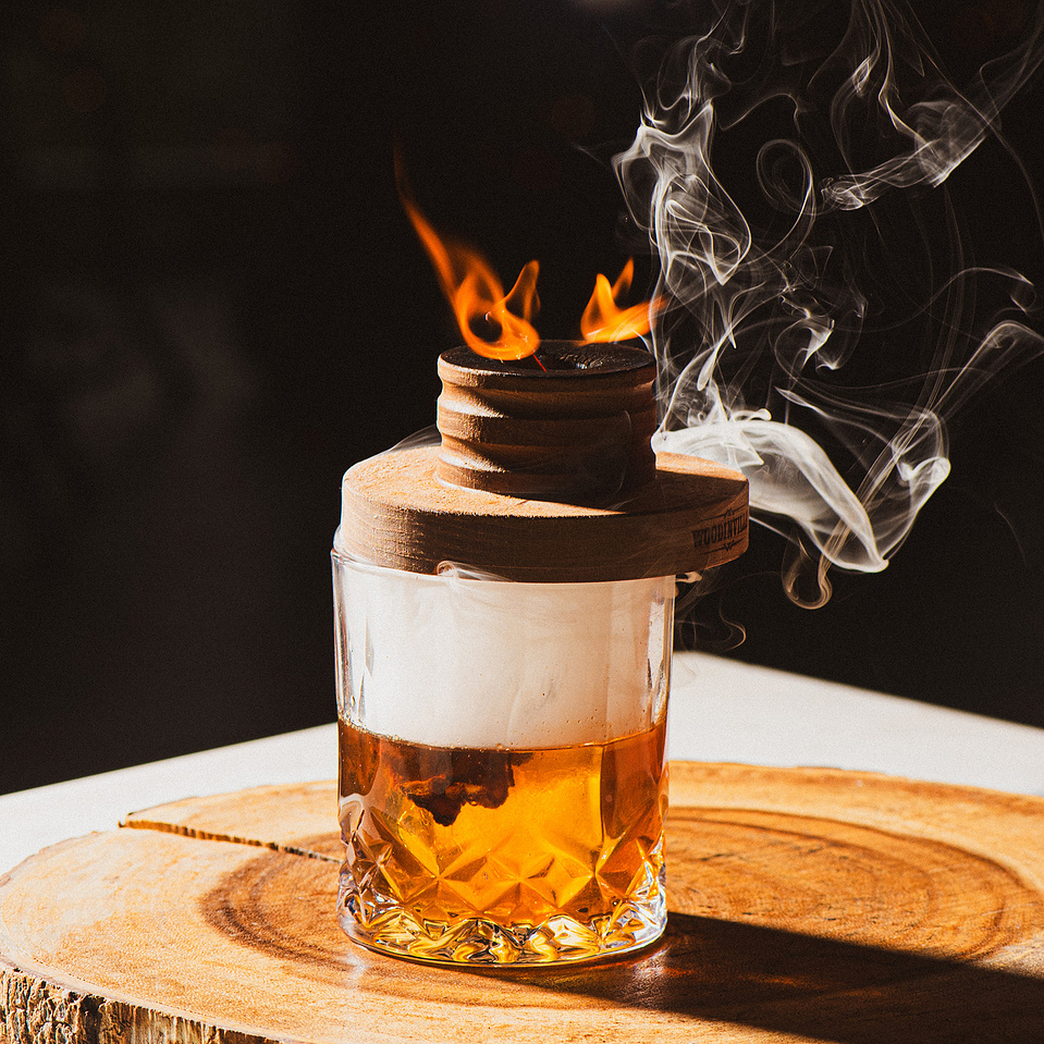 A smoked whiskey cocktail photo at Pillar Bar, a rooftop bar in Asheville, NC