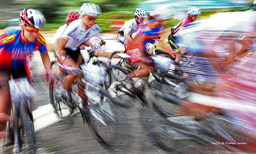 Sports photography by Andreas Iacovou, showing cyclists in a race.