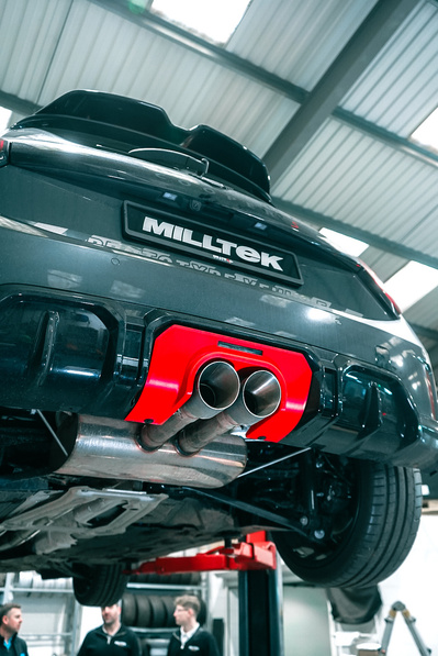 Milltek Exhaust on a Mini F66 on a garage ramp