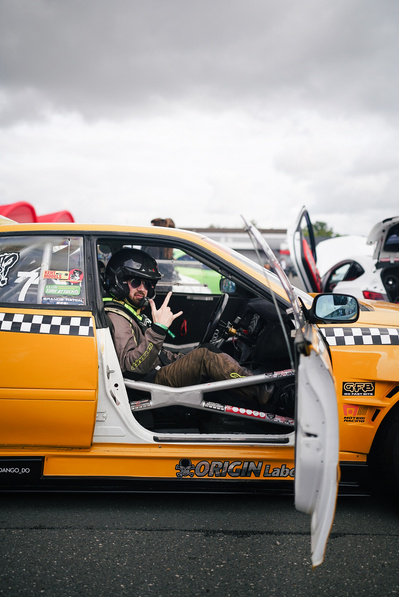 drift car racer at the race track in his drift car