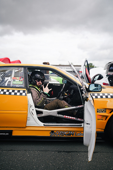 drift car racer at the race track in his drift car